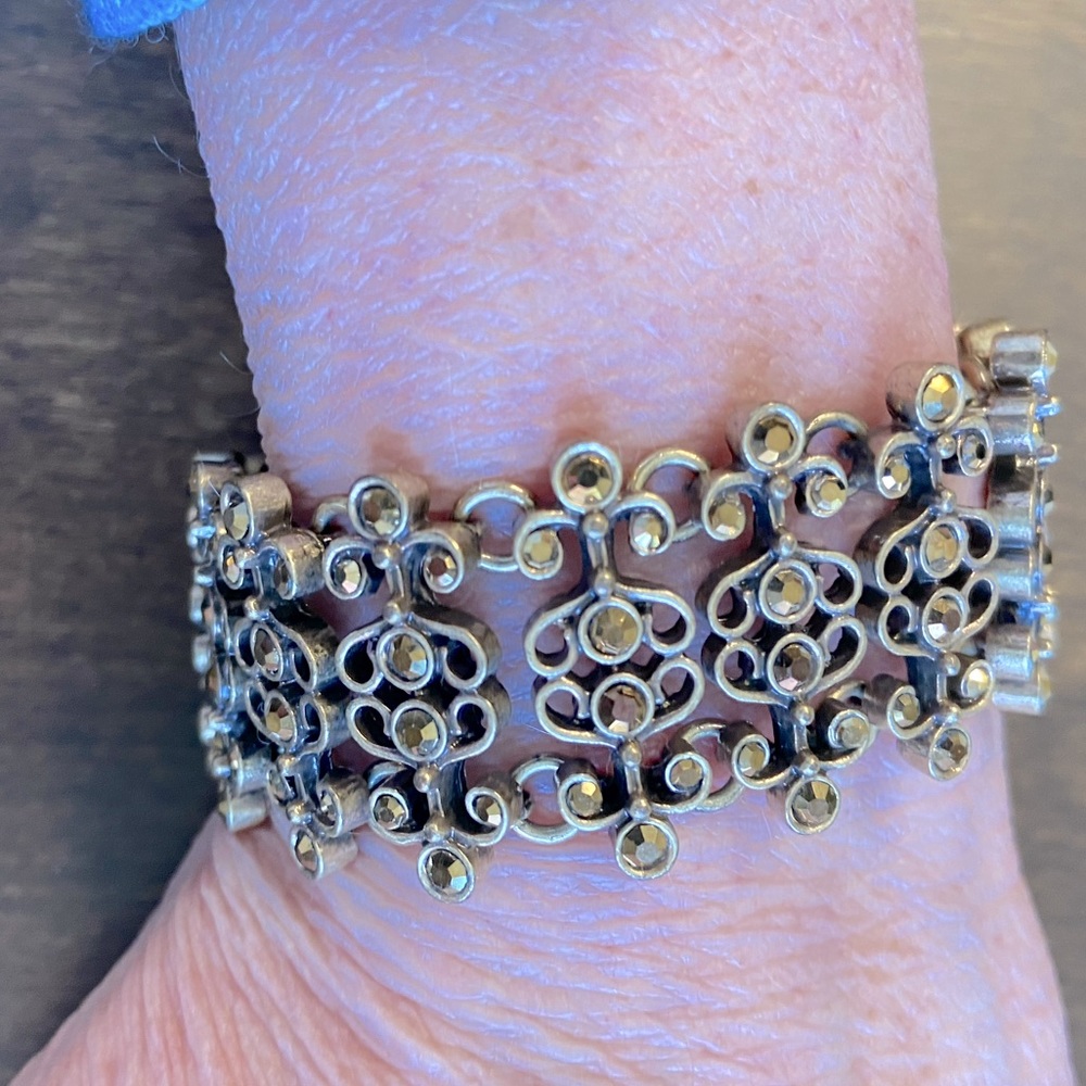 Beautiful gold toned, jeweled bracelet.